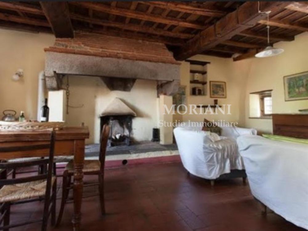 PODERE IL PERACCIO - SOGGIORNO CON CAMINETTO